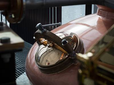 Close up of The Clydeside Distillery's spirit still and door 