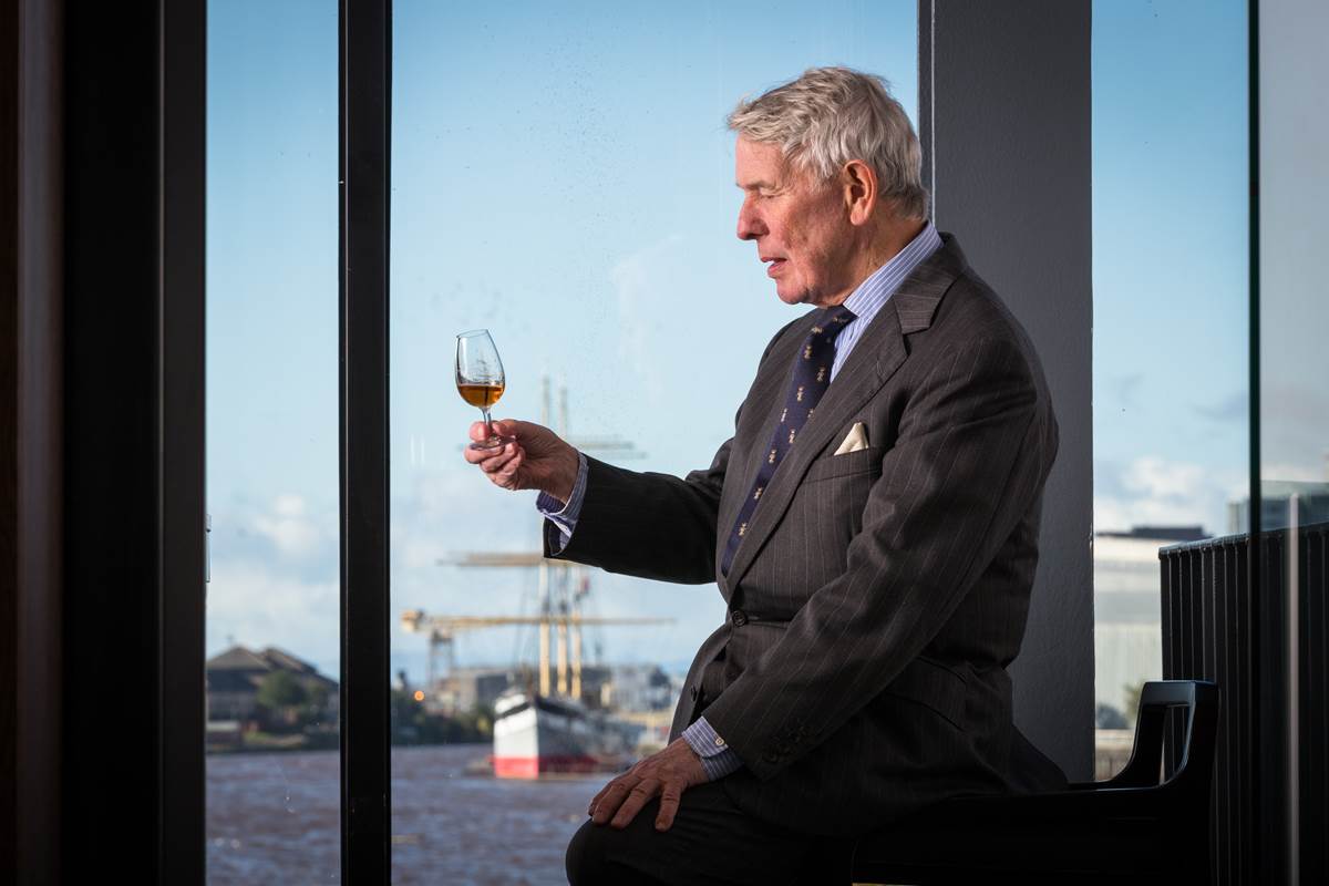 Tim Morrison, Chairman of The Clydeside Distillery, with a glass of whisky 