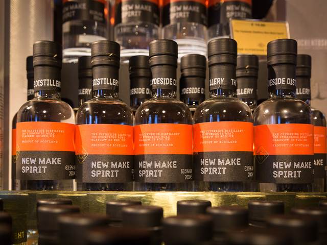 Bottles of The Clydeside New Make Spirit on display in the retail shop