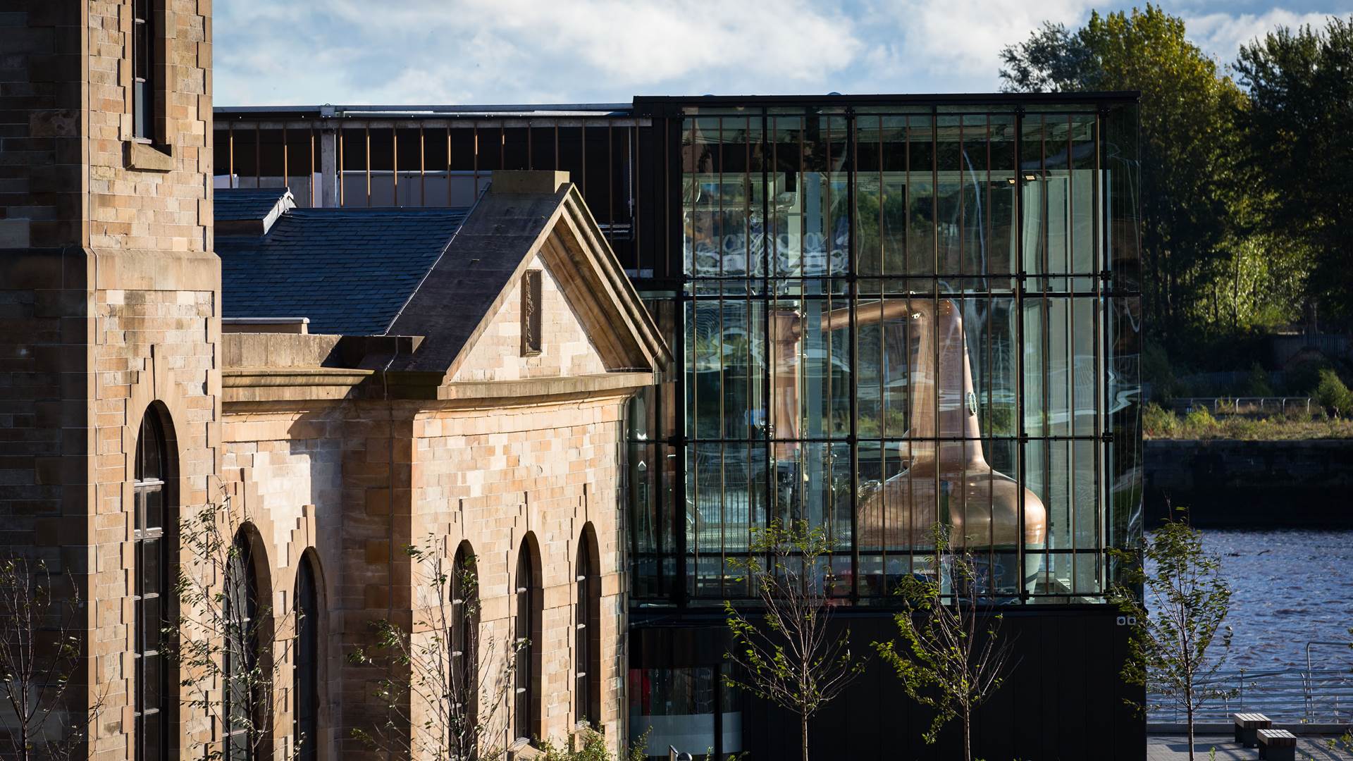 External image of The Clydeside Distillery with the original Pumphouse and modern, glass Still House