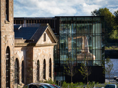 External image of The Clydeside Distillery with the original Pumphouse and modern, glass Still House
